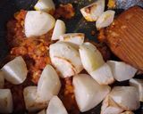 A picture of step 12 of Shaljam Gosht.