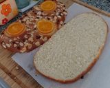 Foto del paso 14 de la receta: Coca de Sant Joan v3: De naranja confitada, almendras y pepitas de chocolate rellena de trufa y nata