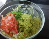 A picture of step 3 of Cheese nachos with salsa and guacamole.