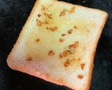 A picture of step 2 of Garlic cheese bread.