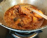 A picture of step 8 of Onion Tomato Chicken.