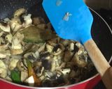 A picture of step 4 of Garlic Mushrooms Green Peas and Sweet-Corn Fried Rice.