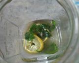 A picture of step 2 of Blue lagoon mojito.