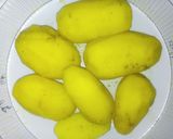 A picture of step 2 of Boiled potatoes in egg and Sauce.