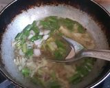 A picture of step 1 of Eggplant curry with millet roti(Ringadano oro bajra na rotla).