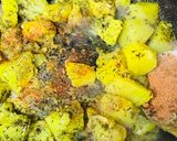 A picture of step 1 of Peri peri semi fried spicy potatoes.