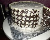 A picture of step 6 of Polka Dot Chocolate Icing cake.