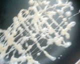 A picture of step 3 of Stick egg net sausage.