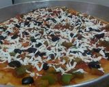 صورة لخطوة 3 من وصفة بيتزا الطاوة 😍