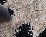 A picture of step 1 of Oats tikki with leafy vegetables.