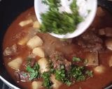 A picture of step 6 of Arvi Gosht.
