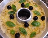 Foto del paso 5 de la receta: Corona de pizza rellena