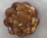 A picture of step 4 of Gur dhana chocolate bitesWhen its engagement or wedding jaggery and coriander seeds are offered.