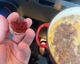A picture of step 1 of Spanish bean soup with smoked sausage and potato.