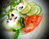 Une image de l'étape 2 de Courgette farcie Macédoine de riz,thon,olives noir.