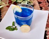 A picture of step 3 of Blue moon drink.