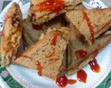 A picture of step 2 of Chilli cheese sandwich.