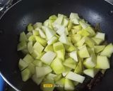 A picture of step 3 of Raw Mango Vaghariyu / Sweet & Sour Mango Pickle.