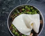 A picture of step 1 of Corn and Raisin Gullak.