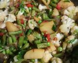 A picture of step 4 of Veg schezwan pulao.
