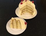 A picture of step 16 of Vanilla Layer Cake filled withLenon and Rasberry and frosted with Fresh Lemon Cream.