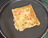 A picture of step 7 of Masala Bread Omlette Street Food.