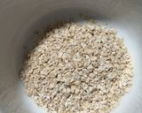 A picture of step 1 of #196 Oatmeal with Walnuts, Raisins, Apples, and Honey.