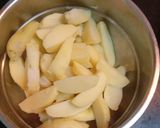 A picture of step 1 of Kumaoni Aloo Gutke with pooris.