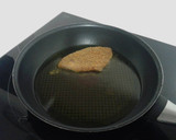 Foto del paso 3 de la receta: Pechugas de pollo rebozadas con doritos