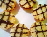 Foto del paso 7 de la receta: Alfajores con masa de coco relleno de frosting de chocolate