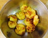 A picture of step 1 of Kochu Pata Chingri.