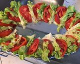Une image de l'étape 4 de Salade feuille de chêne aux tomates cœur de bœuf,olives vertes et spiruline.