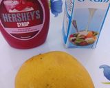A picture of step 1 of Mango Strawberry Cooler.