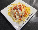 A picture of step 3 of Chicken Loaded Fries:.