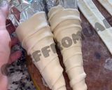 A picture of step 4 of Pizza cones.