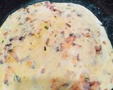 A picture of step 4 of Sattu Paratha with onion.