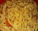 A picture of step 6 of Seafood indomie with fish chunks.