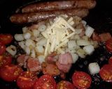 A picture of step 5 of Pork Sausage with Potato, Cherry Tomatoes, and Cheese Sandwich.