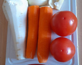 A picture of step 1 of Parsnip,carrot and tomato soup.