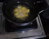 A picture of step 4 of Coconut Kadhi with chana dal dumplings.