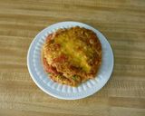 A picture of step 6 of Easy Stuffed Baked Tomatoes.