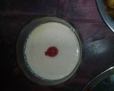 A picture of step 36 of Aloo fulcopi katla rosha ar misti doi.