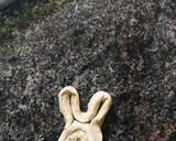 A picture of step 4 of Easter bunny cinnamon rolls.
