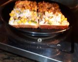 A picture of step 3 of Bread pizza-simple recipe for pizza lovers in lockdown.