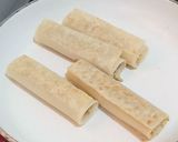 A picture of step 7 of Lasagna Roll Ups.