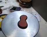 A picture of step 2 of Birthday cake music theme top on fondant guitar 🎸🎸🎸.