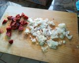 A picture of step 1 of Garlic Soup with Chorizo.