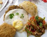 A picture of step 5 of Poached eggs,samosa,hash browns and kachumbari.