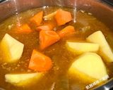 A picture of step 10 of Korean-Style Potato and Pork Rib Soup.