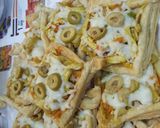 صورة لخطوة 7 من وصفة بيتزا الدجاج بالبف باستري 😋